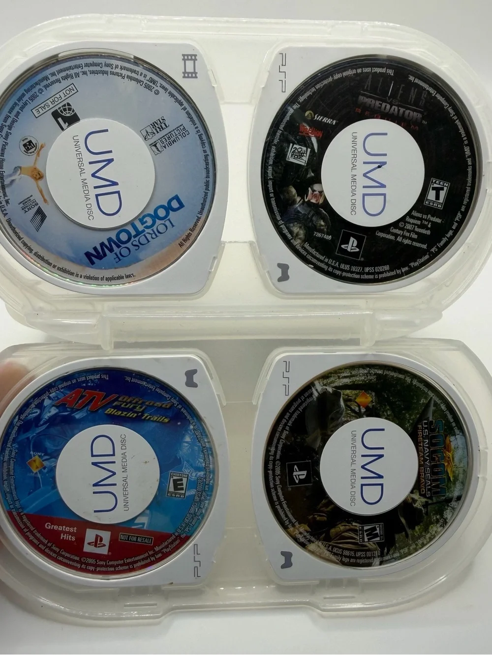 Sony PSP UMD Disc 8-Pack in Clear White Case (7 games, 1 movie)